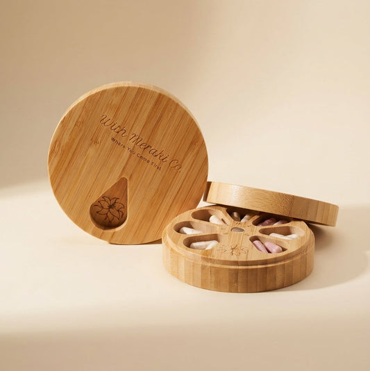 Wooden container with lid on a beige background